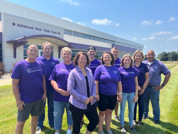 AHT employees in front of MidPort Blvd. location