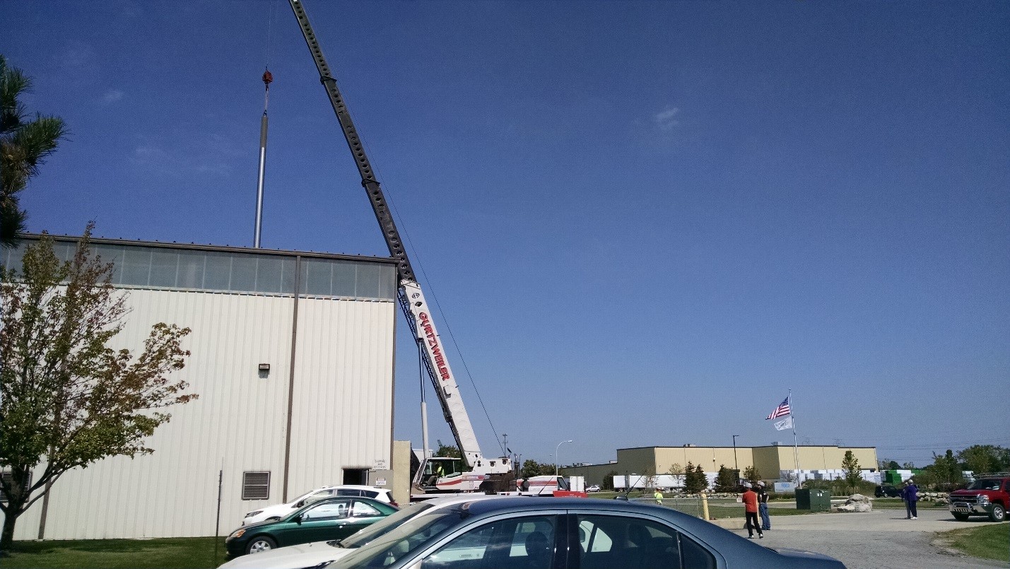 Ion Nitriding of Long Parts- Long Shaft Being Fed Through the Open Roof of AHT